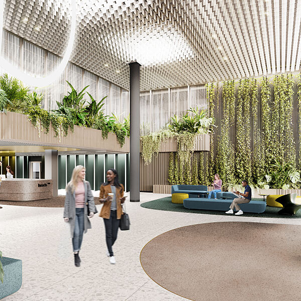 Sitzmöglichkeiten, hohe Rankpflanzen, Human Centric Lighting und ein Concierge-Service stellen Aufenthaltsqualität und Wohlbefinden bereits im Eingangsbereich des ersten Immune Office in den Vordergrund.