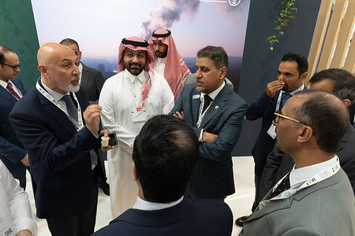 Surrounded by prominent figures, Sultan Alharthi presents Saudi Arabias circular economy initiatives at the IFAT, highlighting the nations commitment to sustainable development.